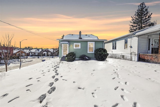 view of snow covered property