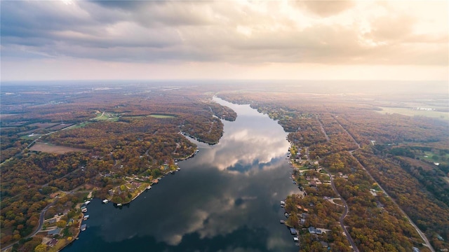 aerial view at dusk with a water view