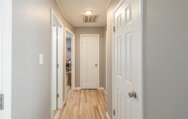 hallway featuring light wood-type flooring