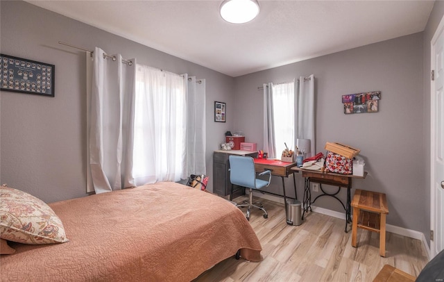 bedroom featuring light hardwood / wood-style floors