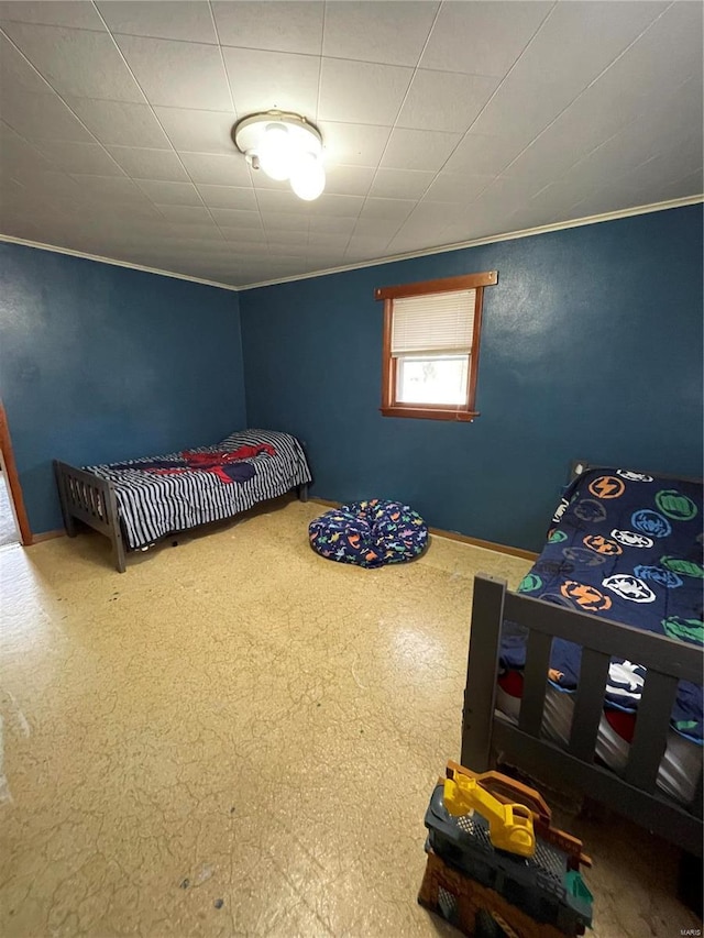 bedroom featuring crown molding