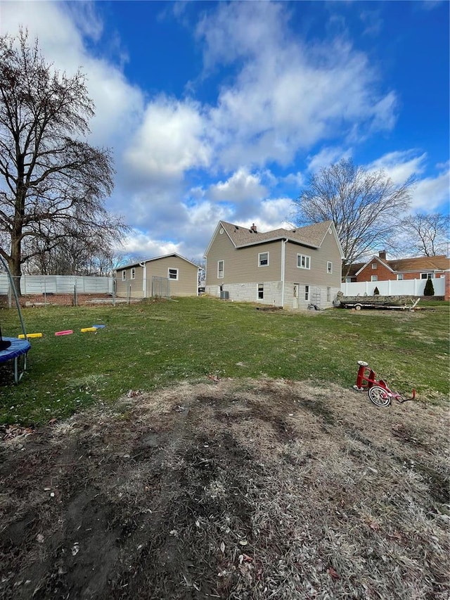 view of yard featuring a trampoline