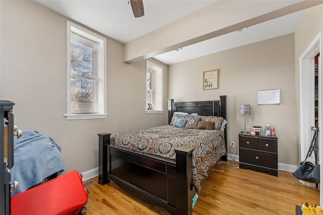 bedroom featuring ceiling fan and light wood-type flooring