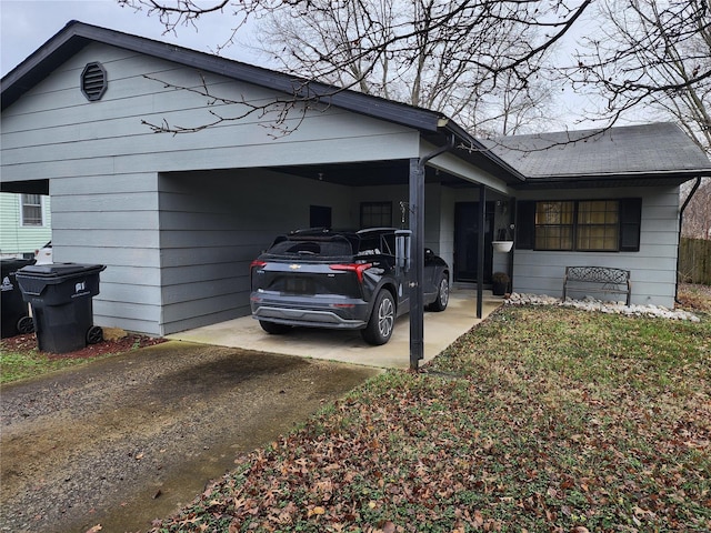 view of home's exterior with a carport