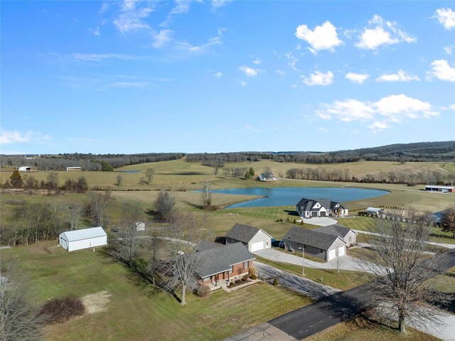 aerial view featuring a rural view and a water view