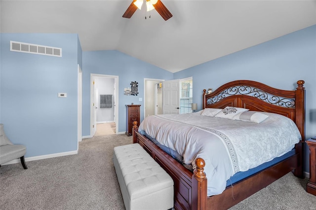 carpeted bedroom featuring lofted ceiling, a ceiling fan, visible vents, and baseboards