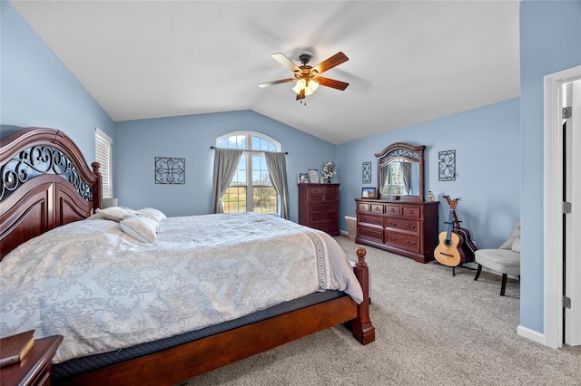 bedroom featuring vaulted ceiling, carpet floors, a ceiling fan, and baseboards