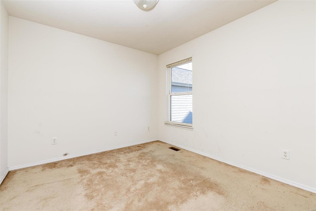 spare room with carpet flooring