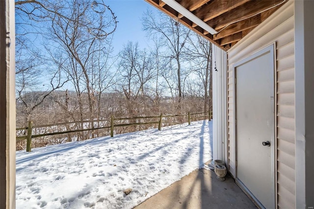 view of yard covered in snow