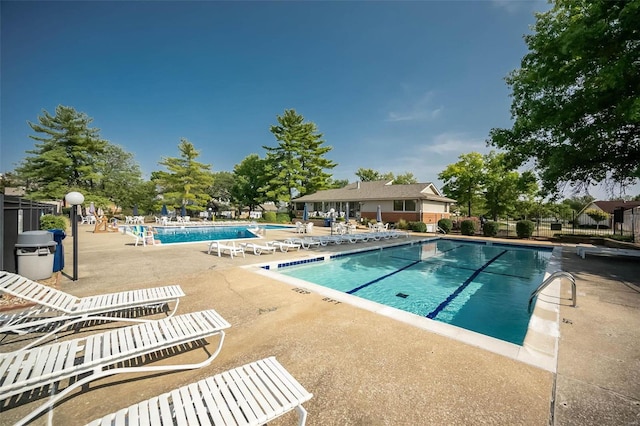 view of pool featuring a patio area