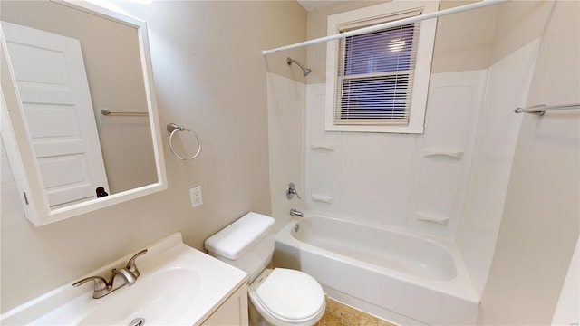 full bathroom with bathtub / shower combination, vanity, and toilet