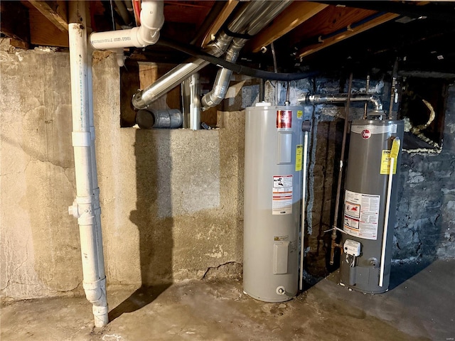 utilities featuring electric water heater and gas water heater