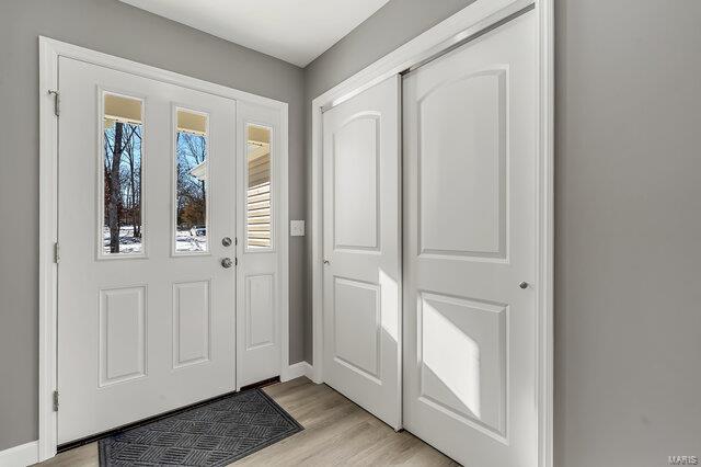 entrance foyer featuring light hardwood / wood-style flooring