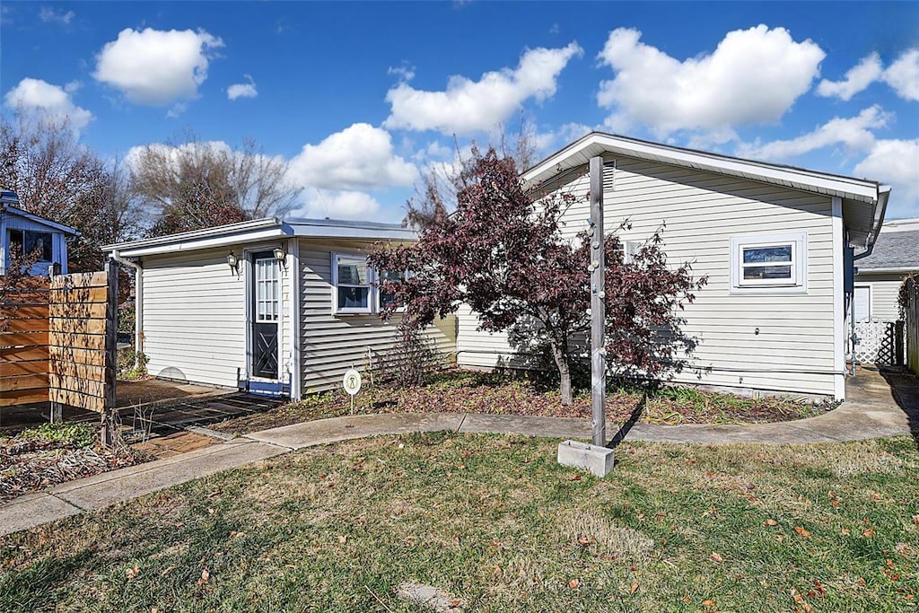 exterior space with a lawn