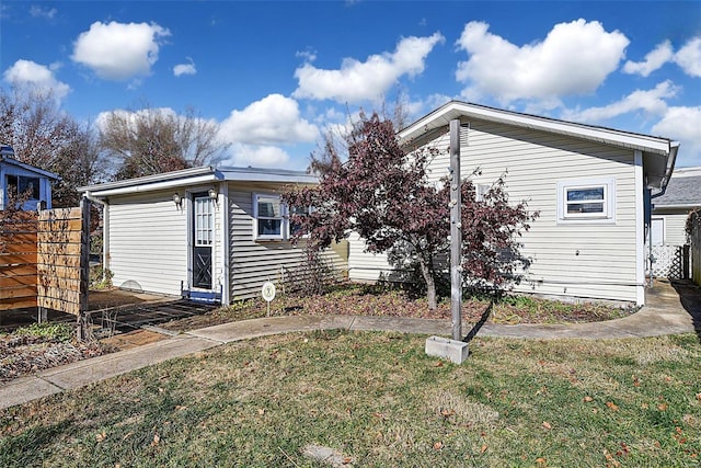 exterior space with a lawn