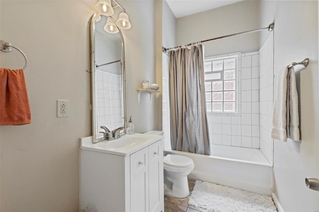 full bathroom featuring vanity, shower / bath combo, and toilet