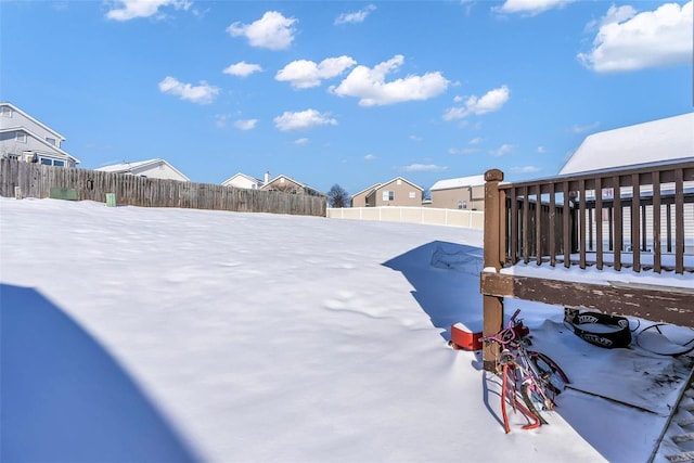 view of yard covered in snow