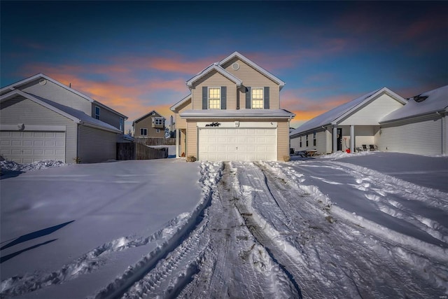 front of property with a garage