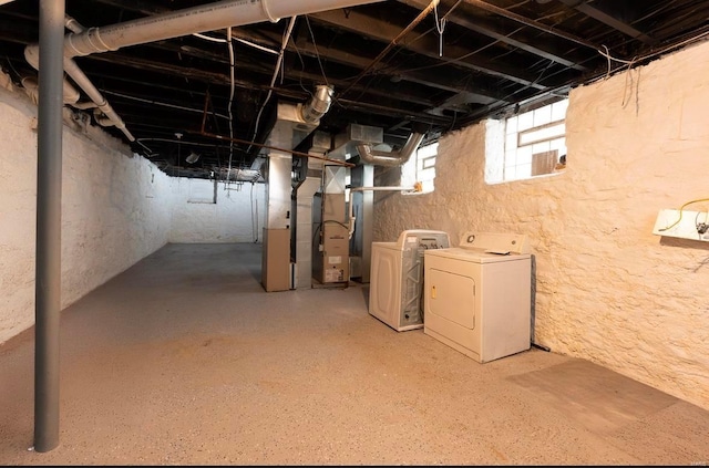 basement featuring washer and dryer