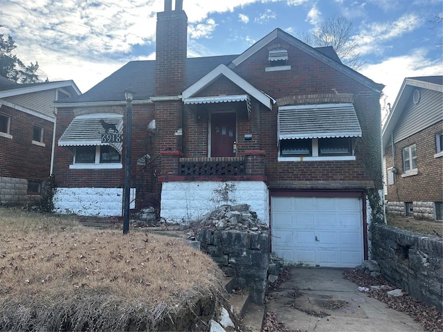 view of front of home with a garage