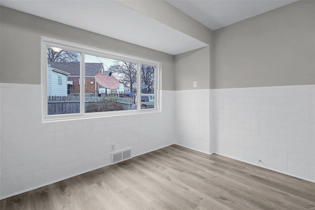 empty room featuring light hardwood / wood-style flooring