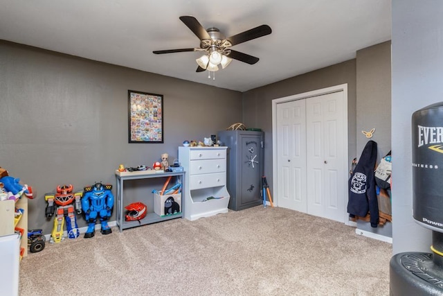 recreation room featuring ceiling fan and carpet floors