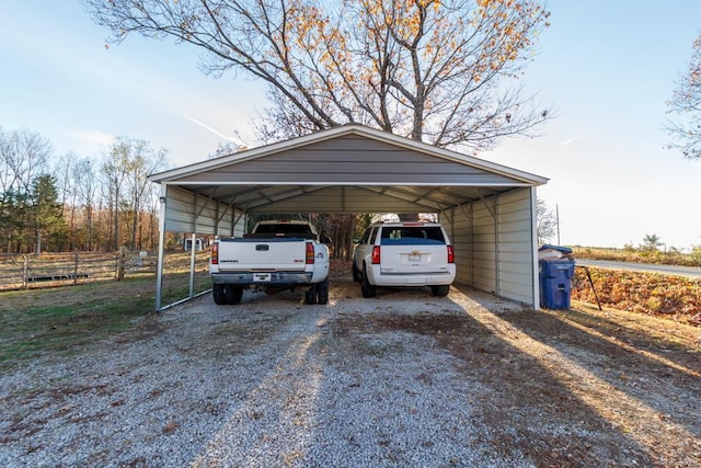 view of parking / parking lot featuring a carport