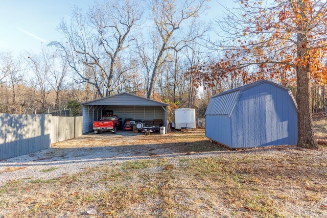 view of outbuilding with a carport