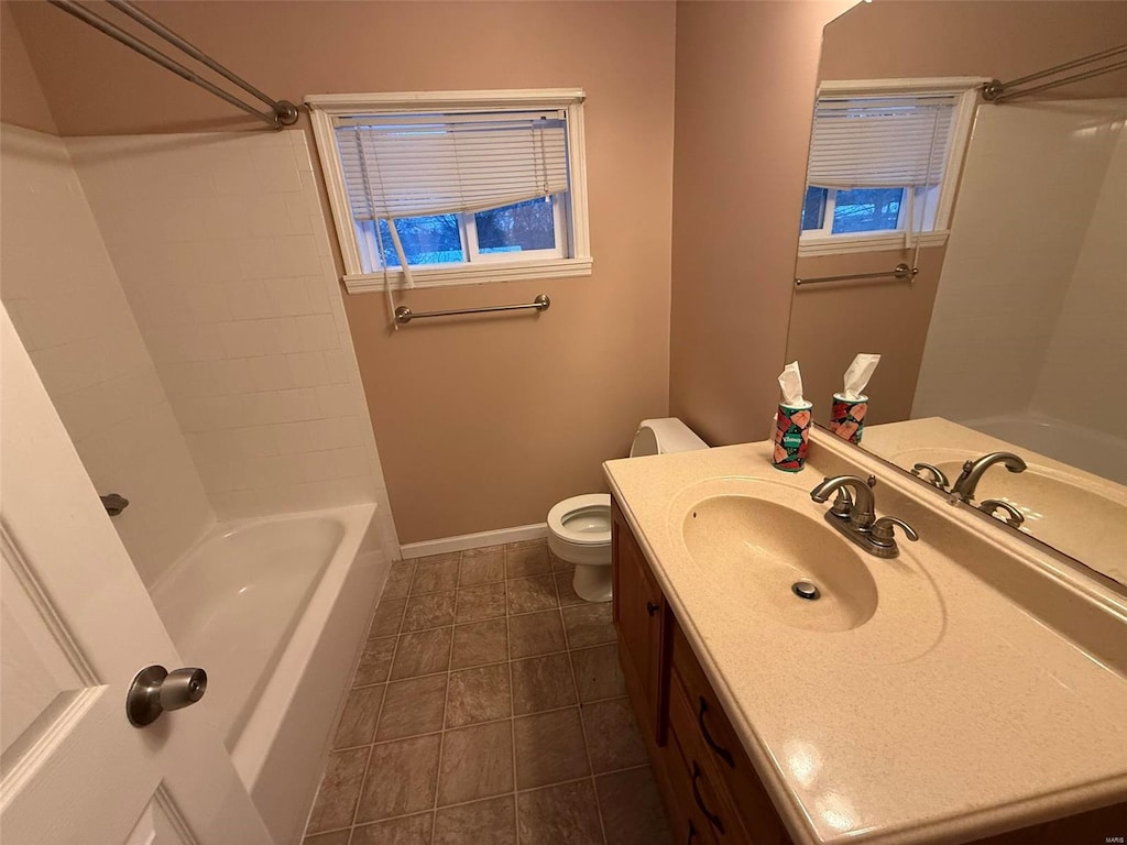 full bathroom with shower / washtub combination, vanity, and toilet