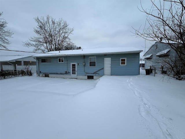 view of snow covered house