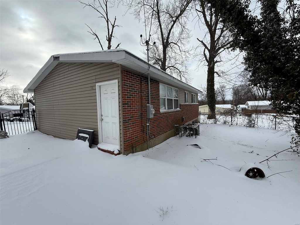 view of snow covered property