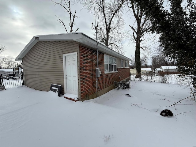 view of snow covered property