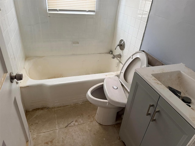 full bathroom featuring vanity, toilet, and tiled shower / bath combo