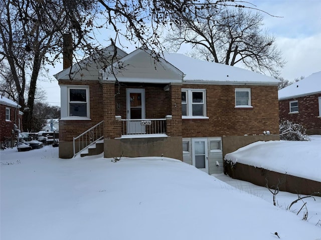 view of snow covered property