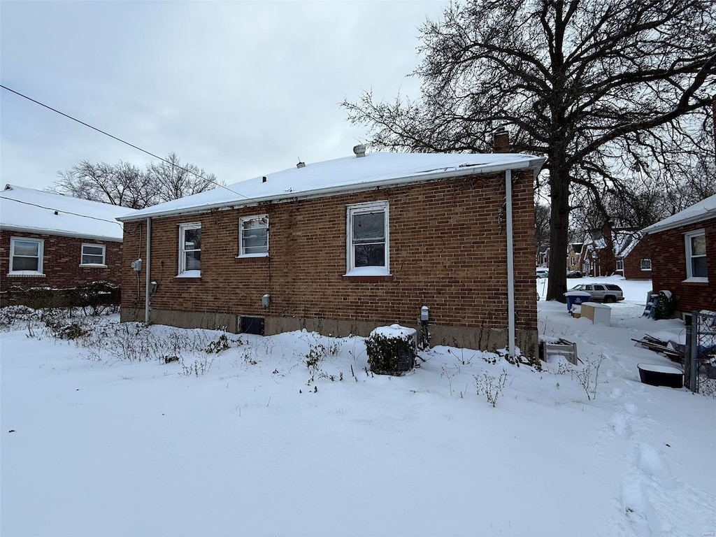 view of snow covered property