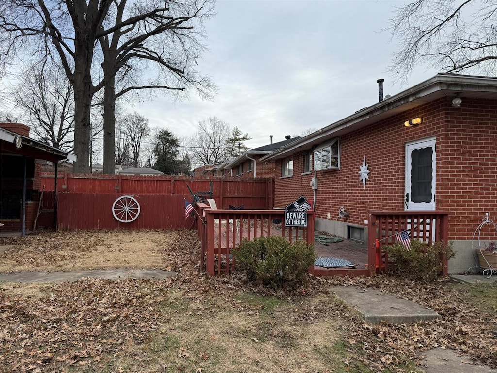 view of yard featuring a wooden deck