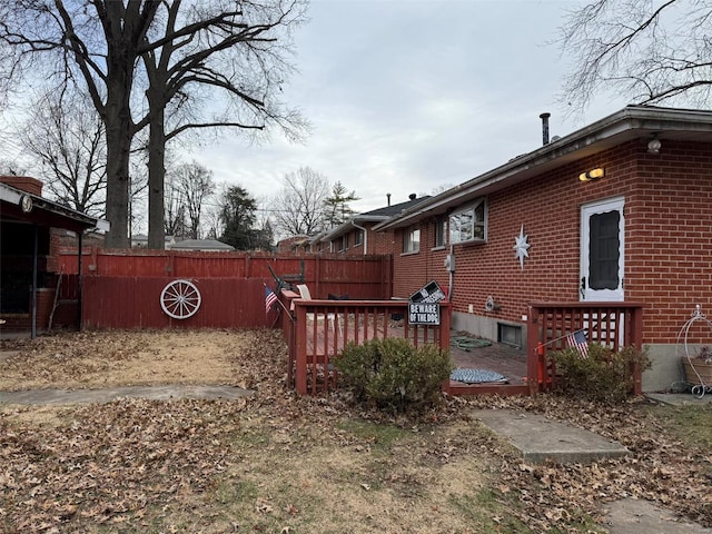 view of yard featuring a wooden deck