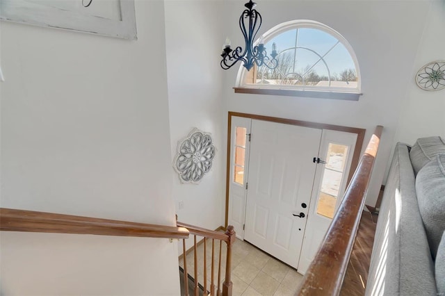 entrance foyer with a notable chandelier