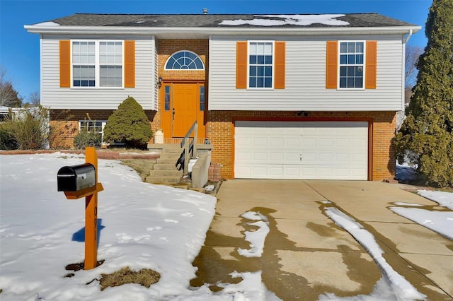 split foyer home featuring a garage