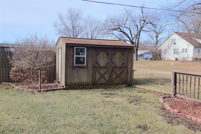 view of outdoor structure featuring a yard