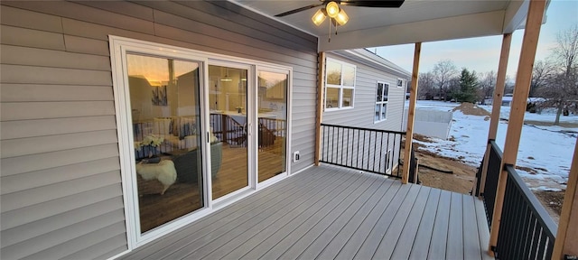 snow covered deck featuring ceiling fan