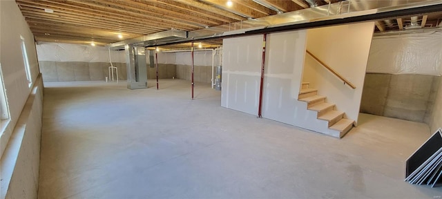 basement with heating unit and water heater