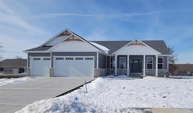 view of front of property with a garage