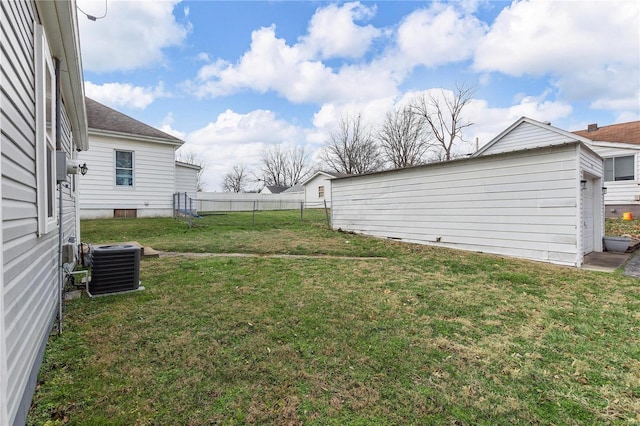 view of yard with central AC