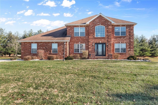 view of front of home with a front lawn