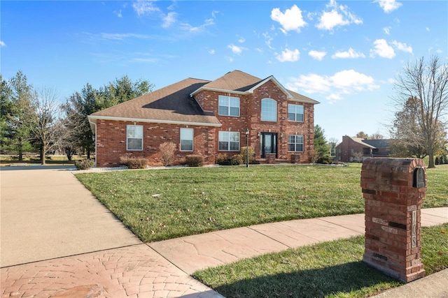 view of front of property featuring a front yard