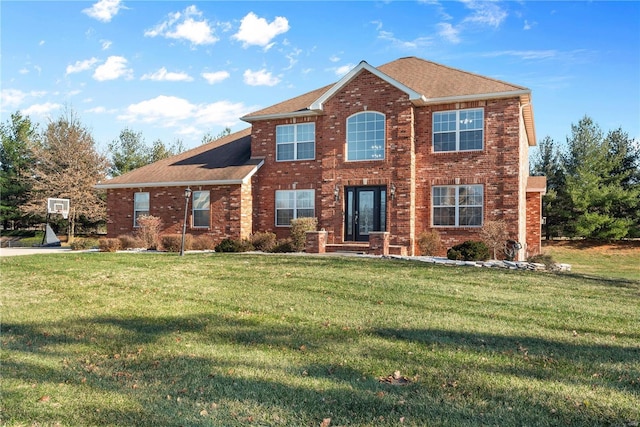 view of front of home with a front lawn