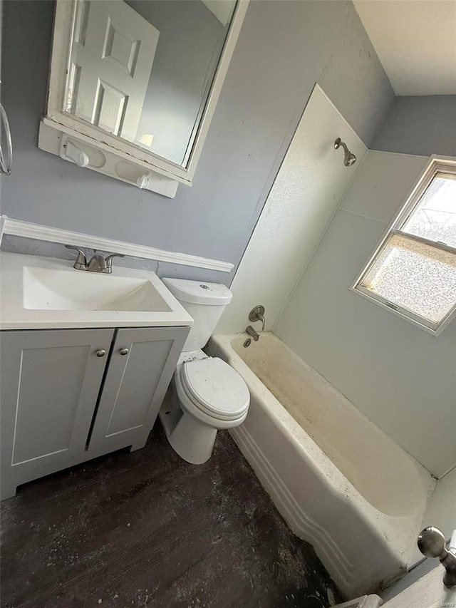 full bathroom featuring vanity, shower / bath combination, and toilet