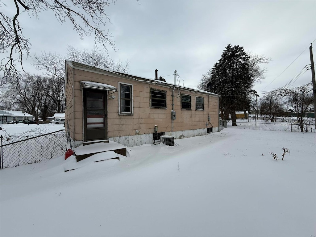 view of snow covered property