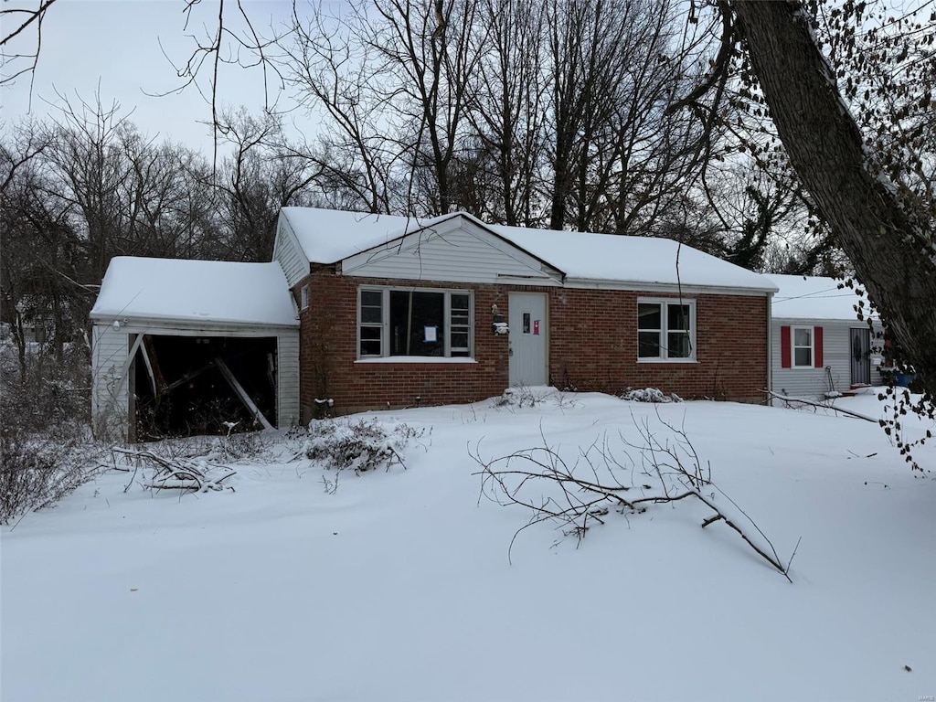 view of front of home with a garage